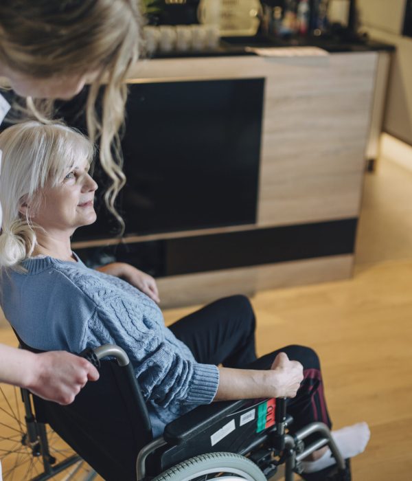 woman-with-nurse-old-age-home